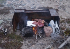 Cooking on an open fire in Nunavut