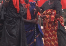 Chief and wife discussing at funeral