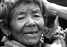 Old lady with her cat