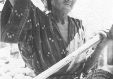 Woman Carrying Supplies