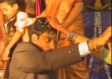 Suit can be replace traditional Indian costumes at wedding, but not the usage of Rice at Wedding