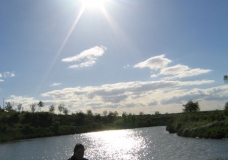 sun above a little lake