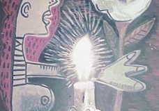 Girl, candle and flower.