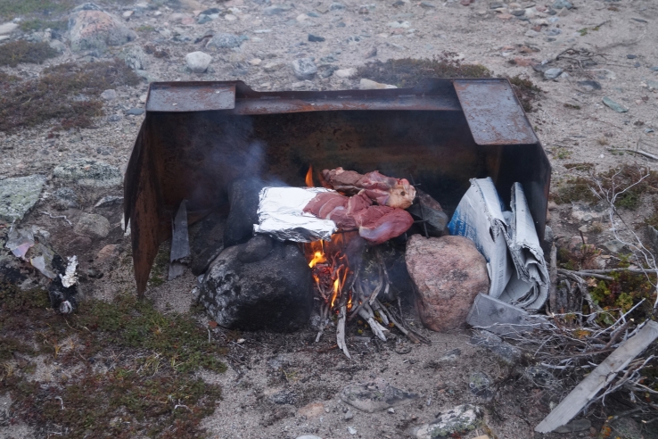Cooking on an open fire in Nunavut