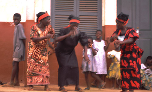 Woman dancing at funeral