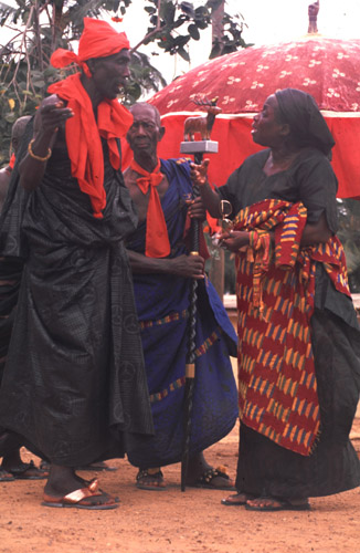 Chief and wife discussing at funeral