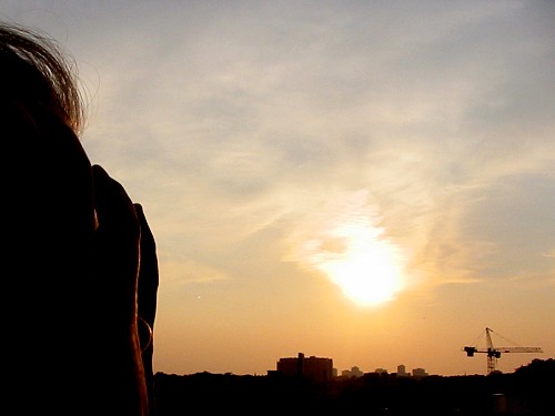 Evening Flare and Face - Toronto, Canada, July 2002