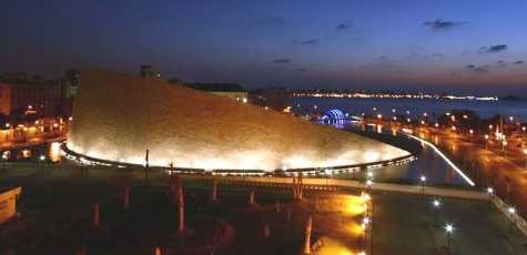 BIBLEOTHECA ALEXANDRINA IN NIGHT FROM EAST