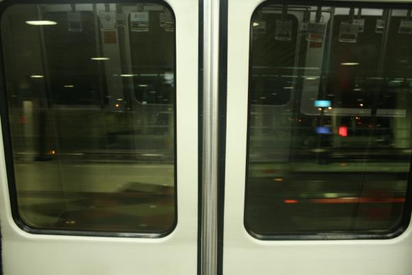 Peering out an aerotrain in Kuala Lumpur International Airport