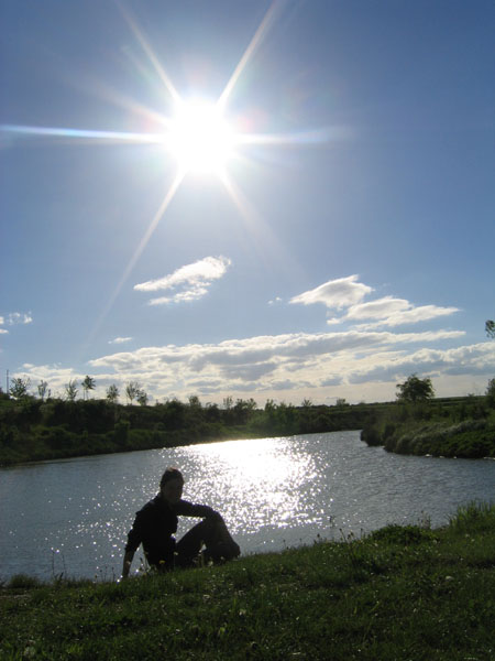 sun above a little lake