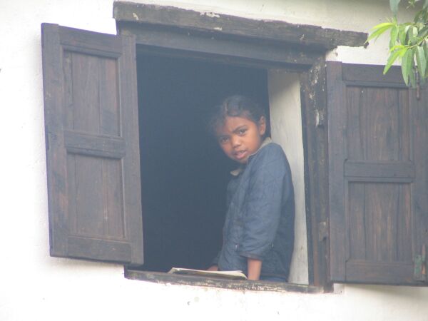 Rural malagasy girl learning lessons