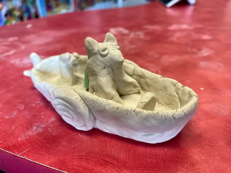A clay sculpture created during a session with Quamuat / Winnipeg Art Gallery
